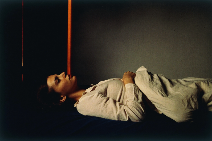A woman lying wide awake in the dark long after she meant to be asleep